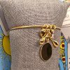 bracciale-piastrina-lato-1 Bracciale Rigido Sottile con Pendenti