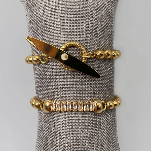 bracciali_sfere_ottone-1 Bracciali con perle rotonde in ottone